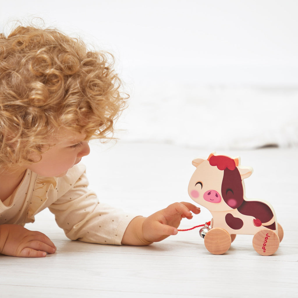 toddler playing with a toy