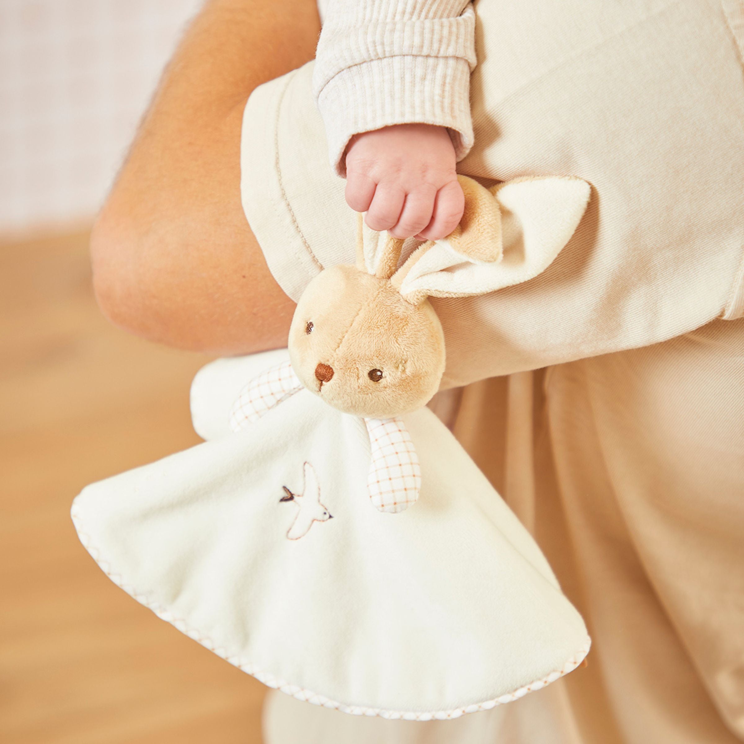 Baby with comforter 