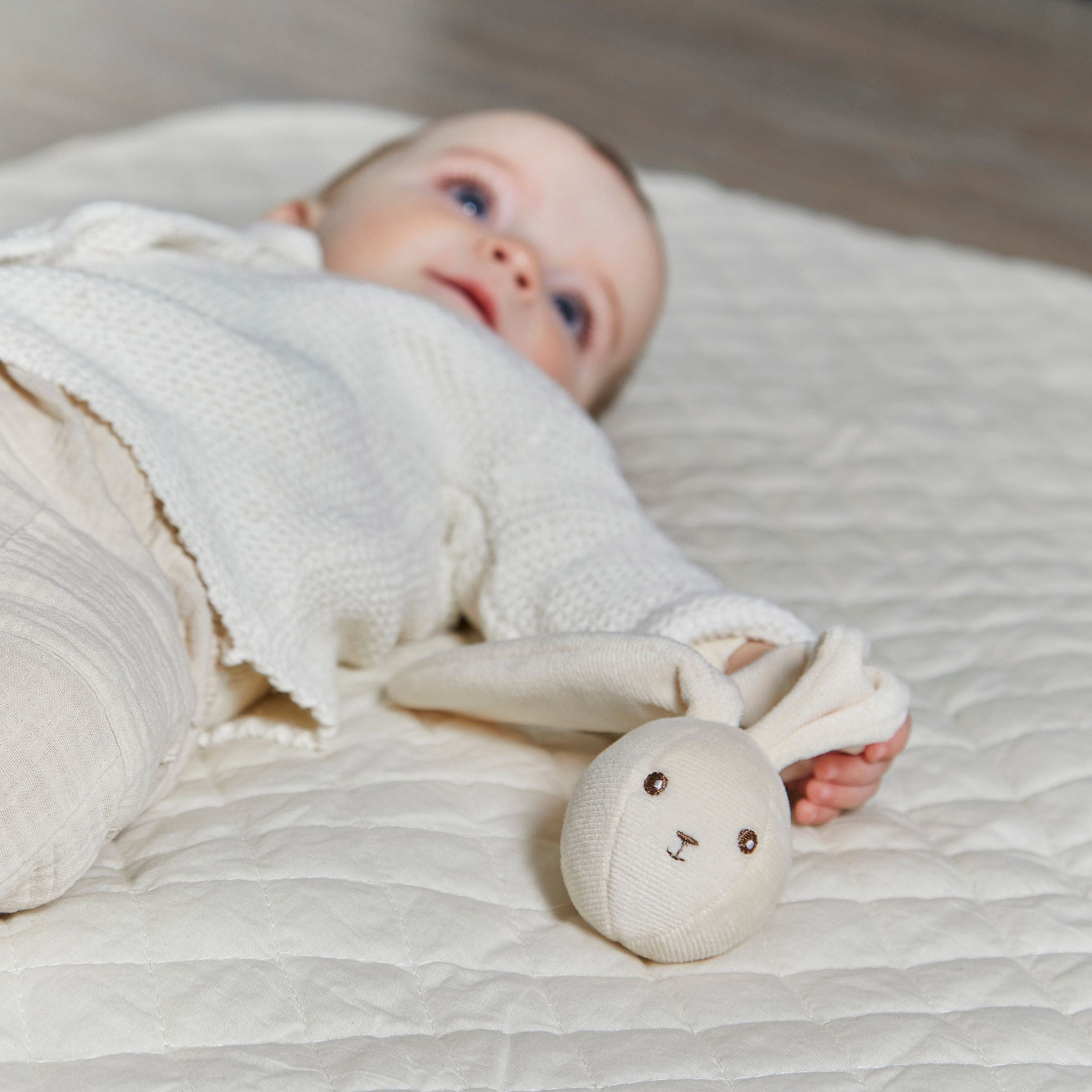 Baby with rattle 