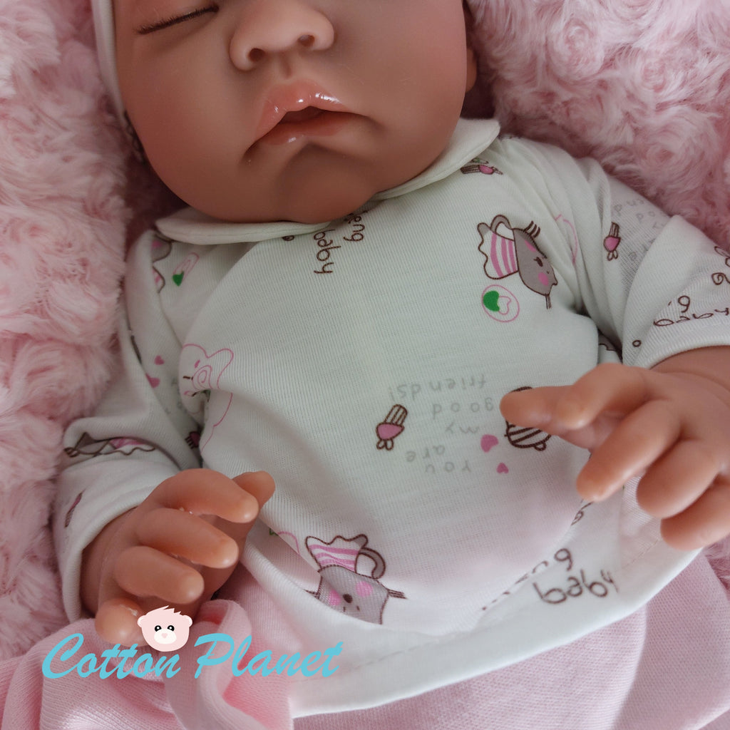 Newborn Doll Sleeping on a Pillow by Antonio Juan | Cotton Planet